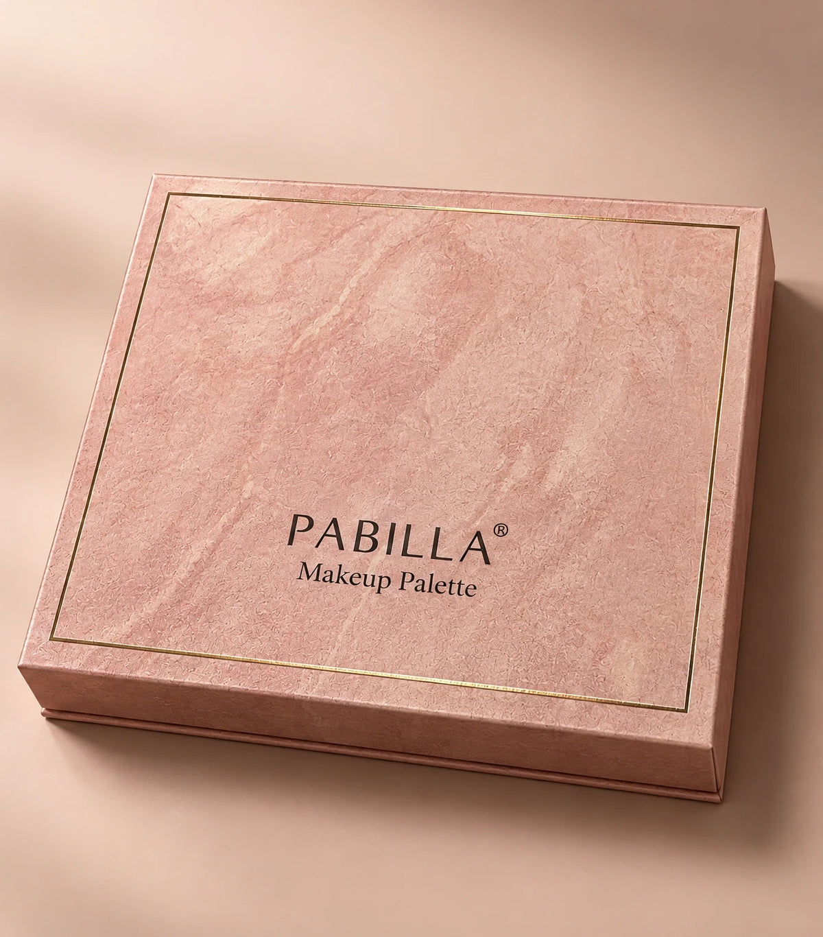 The Riviera Rose box in rose marble with a gold frame
